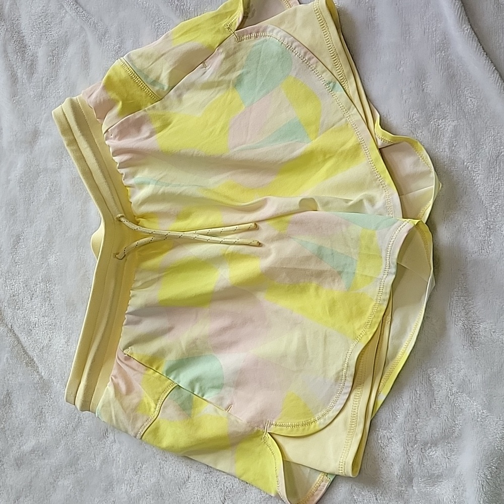 All in Motion 2 in 1 Lemon Yellow Double Layer shorts.  Size 10-12